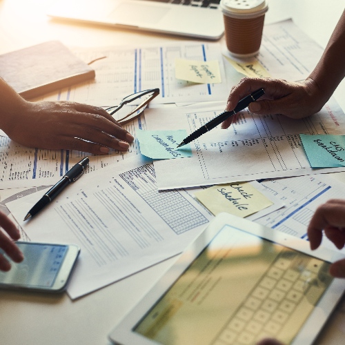 Documents technology and hands of business people in meeting