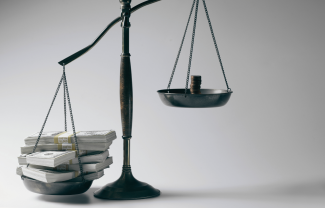 Scale to demonstrate financial inequity and broken systems